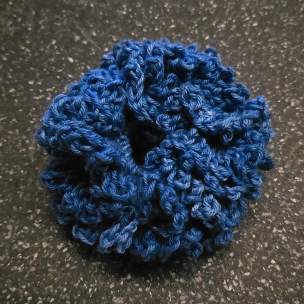 Large ruffle crochet hair scrunchie.